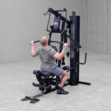Body-Solid G6B Bi-Angular gym — lat pulldown in use