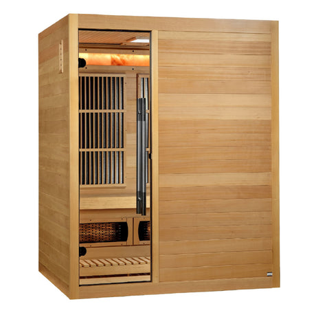 Three person indoor hybrid sauna in hemlock with a narrow glass door, angled left