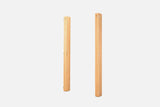 Two folded pale-oak wall racks standing upright, with silver hinges along the seam