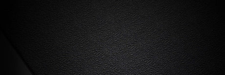 Close-up of textured black SuperMats TreadMat surface