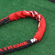 XM Fitness Battle Rope Shield on green turf