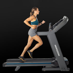Woman running on Horizon 7.4AT-02 Treadmill Best Entry Level Treadmill